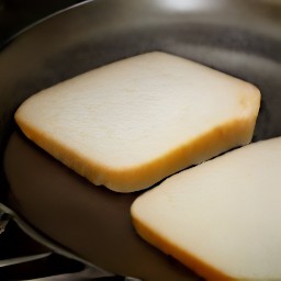 a piece of white bread that has been cooked for 3 minutes on medium heat.