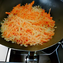 a stir-fry with canola oil, ginger, red onions, shiitake mushrooms, cabbage, carrots, garlic sprouts, salt and black pepper.