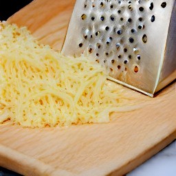 the output is grated parmesan cheese.