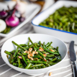 

This vegan, gluten-free and lactose-free side dish is a tasty mix of garlicky roasted green beans, shallots and hazelnuts - perfect for those looking for healthy recipes.