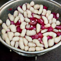 the red and white kidney beans are rinsed and then drained.