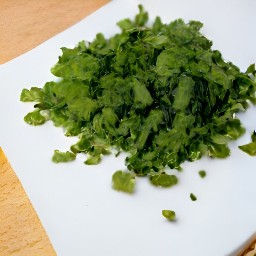 the output is small chunks of orange and cucumber, and finely chopped coriander.