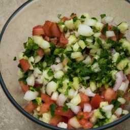 

This fresh and light vegan salad is made with crisp cucumbers, juicy tomatoes and onions, making it a perfect side dish for any meal!