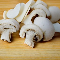 the white mushrooms are cut into slices.
