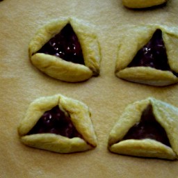 a hamentashen dough with cherry pie filling.