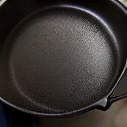 the skillet dish is coated with cooking spray and is now heated.