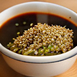 a sauce made from rice vinegar, soy sauce, honey, sesame oil, chili paste, sesame seeds, ginger and green onions.