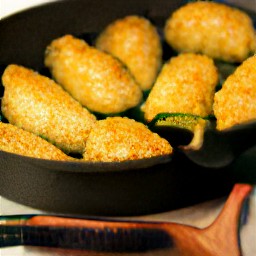 the breaded-stuffed jalapeno peppers were flipped over with a slotted spoon.