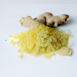 the ginger root grated into small pieces.