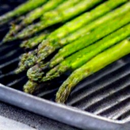 the asparagus was turned over with tongs.