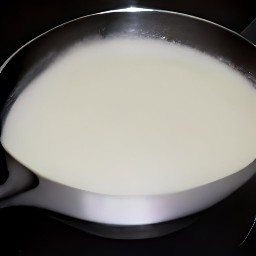 the milk is heated in a pan.