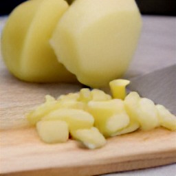 you will have cut potatoes in half, chopped parsley, and peeled onions that are cut in half and chopped finely.