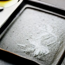 the baking sheet is coated with a thin layer of olive oil.