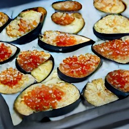 the tomato sauce is transferred to the roasted eggplants. scatter with chopped parsley, basil, oregano, mozzarella cheese, and parmesan cheese.