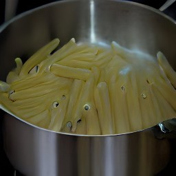 the penne pasta is cooked and ready to eat.
