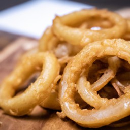 
French fried onions are a delicious European side dish and appetizer made with onions, whole milk, and all-purpose flour - free of eggs!