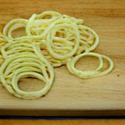 onions that are peeled and sliced into thin rings.