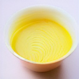 the egg is cracked in a bowl and beaten with a fork.