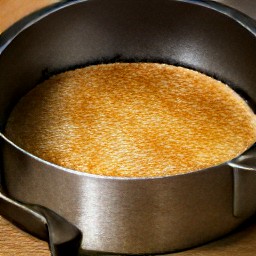 the springform pan placed in a hot oven. after 10 minutes, the crust removed from the oven.