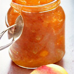 the peaches mixture is put in a sterile jar and covered with a lid.