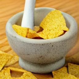 a bowl of crushed tortilla chips.