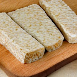 garlic that is peeled and minced, and tempeh that is cut into 0.5-inch wide strips.