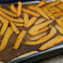 a tray of oven-baked fries.