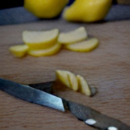 russet potatoes that are cut into 0.5-inch sticks and lemon wedges.