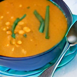 a serving bowl filled with vegetable and lentil mixture.