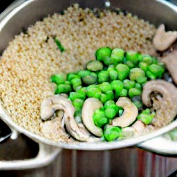 a pot of quinoa and snow pea soup.