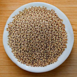 the quinoa is transferred to a plate.