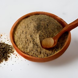 a mixture of basil, thyme, garlic powder, white pepper, black pepper, salt, onion powder and paprika.