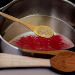 a thickened mixture that becomes strawberry jam.