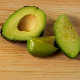 the avocado halves are peeled with a spoon.