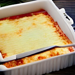 the lasagna is cut into 8 squares.