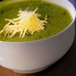 green veggie soup with grated cheese.