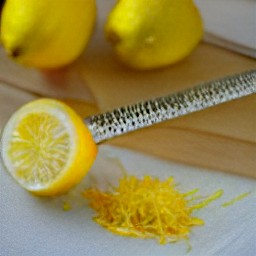 the lemons are zested using a zester.