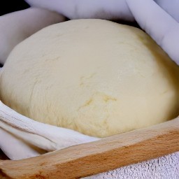 the dough is now covered with a towel.
