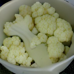 a bowl of cooked cauliflower.