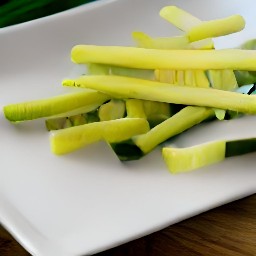 zucchini that are trimmed and cut into 0.75 inch sticks.