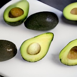 the avocado is cut in half.