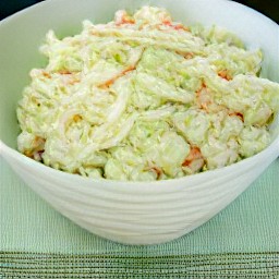 the dressing is mixed in a large bowl for 3 minutes, then covered with cling film and chilled in the fridge. to serve, the bowl is removed from the fridge and the cling film is removed.