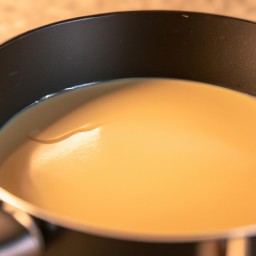 

Cream gravy is a European, dairy-based sauce that can be used to top dinner dishes or as a dip. It's made of whole milk and free of eggs, nuts and soy.