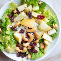 

A refreshing and nutritious fruit salad with lemon poppy seed dressing, free of eggs and gluten - containing lettuce, swiss cheese, cashew nuts, dried cranberries, apples and pears.
