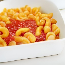 a pasta dish with cheddar cheese.