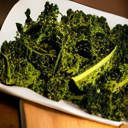 the kale chips are transferred to a plate.