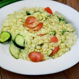 a mixture of dried zucchini slices and tomato.