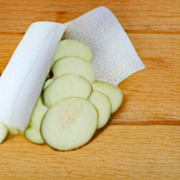 the zucchini slices are covered in salt and have a quarter tsp of salt sprinkled over them.