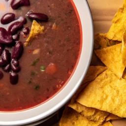 

Bean soup is a flavorful, gluten-free, eggs-free and soy-free dish made of onions, garlic, tomatoes, black beans and barbecue sauce topped with tortilla chips.