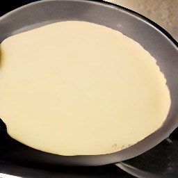 a pancake made that is approximately 2 minutes cooked.